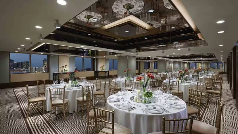 Chater Room at Mandarin Oriental: elegant event space with floral centerpieces, ideal for weddings.