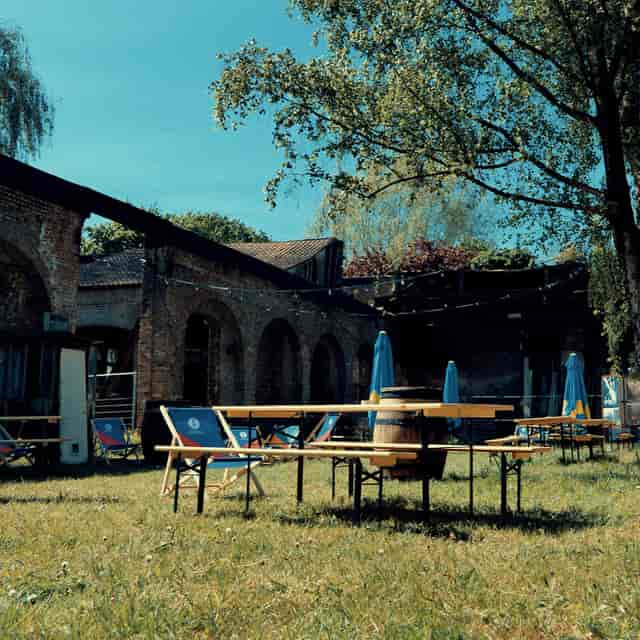 Outdoor venue Salle des Ciseleurs with rustic architecture for casual gatherings and events.