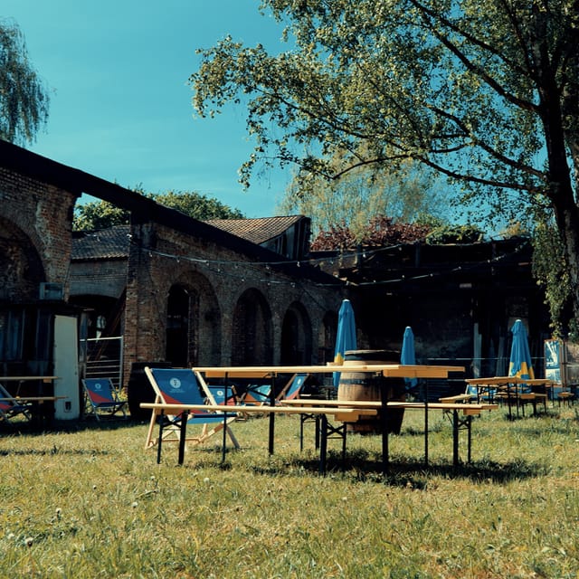 Outdoor venue Salle des Ciseleurs with rustic architecture for casual gatherings and events.