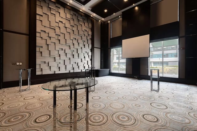 Modern event space at Al Nada 1, Radisson Blu Dubai, ideal for meetings and presentations.