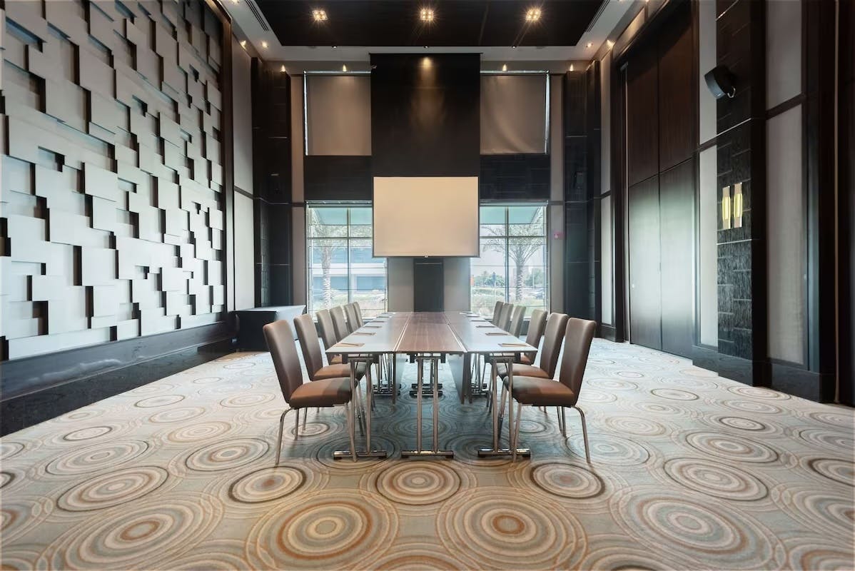 Modern conference room at Radisson Blu Dubai, ideal for corporate meetings and workshops.