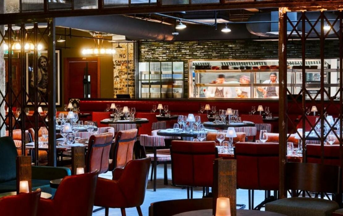 Stylish restaurant at New Road Hotel, ideal for corporate dinners and private events. - Banner