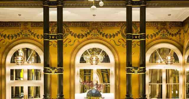 Baccarat Ballroom at Hilton Paris Opera: elegant event space with ornate walls, ideal for gatherings.