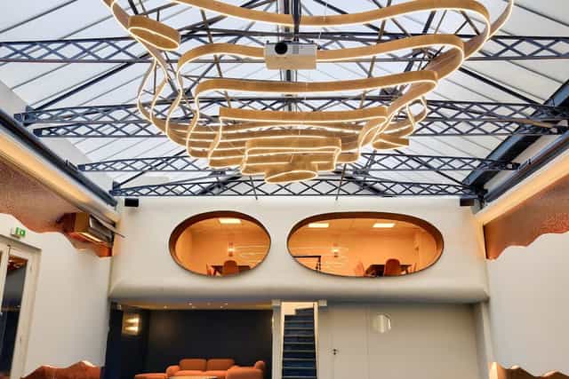 Modern event space with unique ceiling design at Maison Boétie for corporate meetings and gatherings.