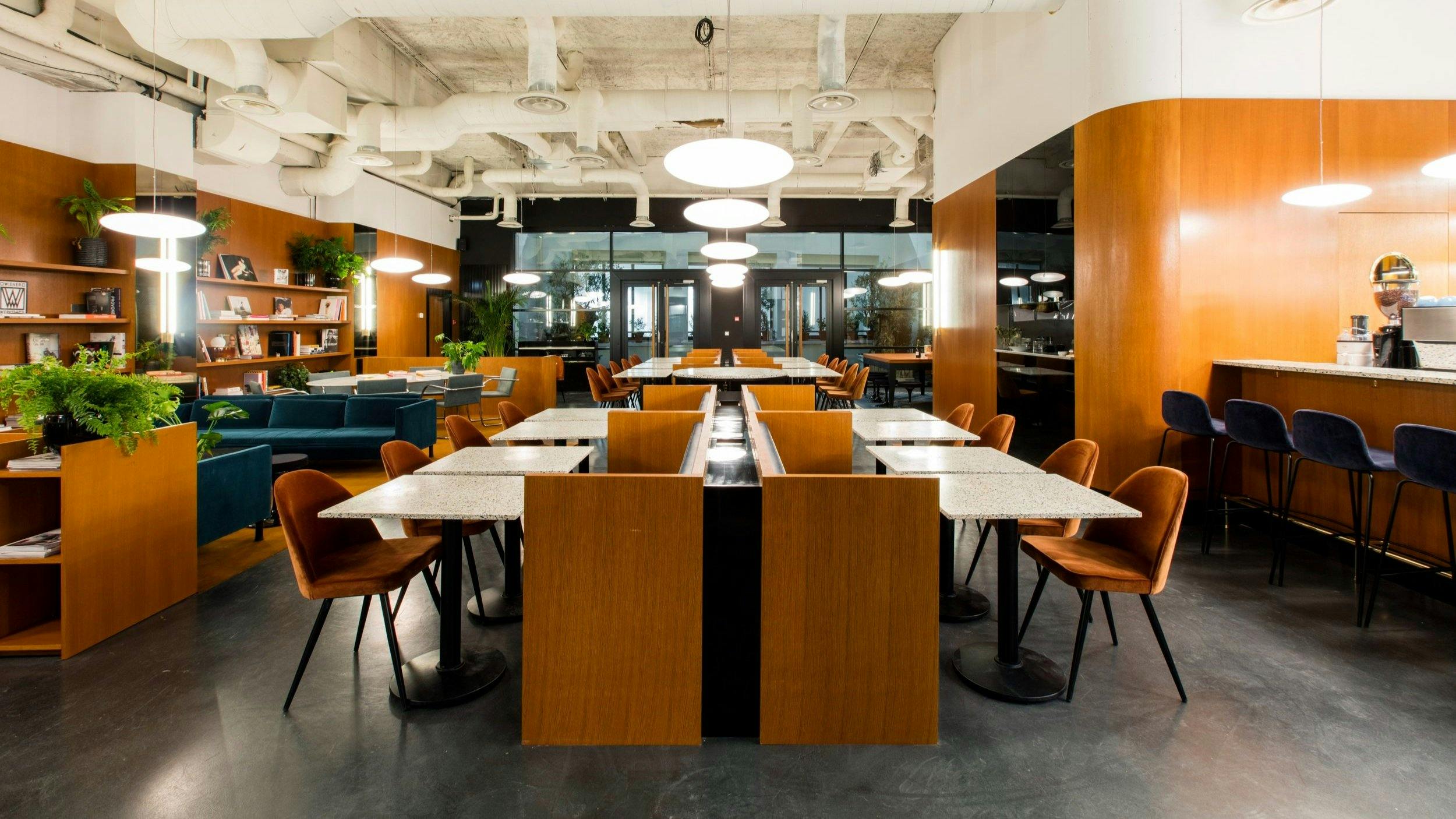 Modern event venue with flexible seating for meetings and networking in The Bureau.