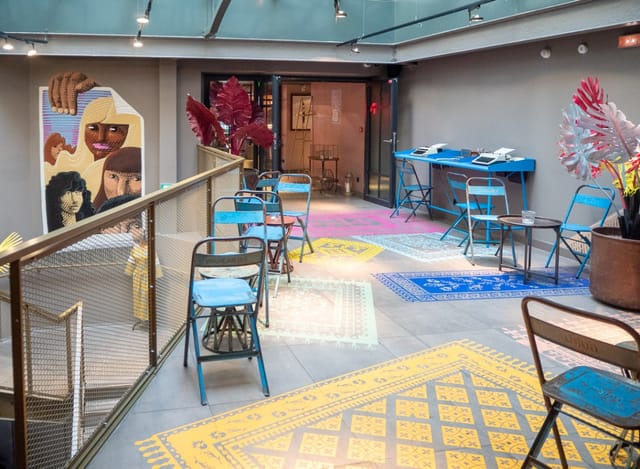 Vibrant Speakeasy event space at 25hours Hotel Paris, ideal for networking and meetings.