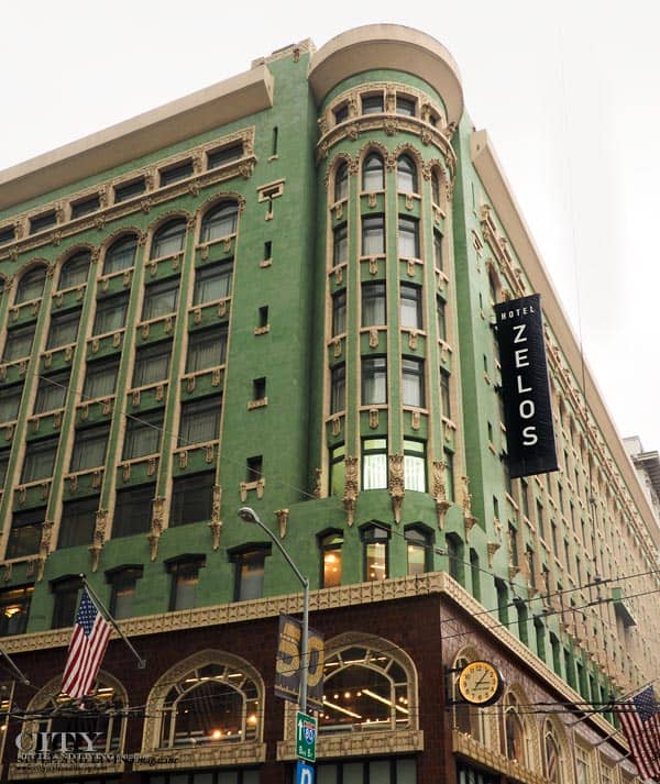 Hotel Zelos San Francisco exterior, vibrant green facade, ideal for events and meetings.