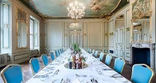 Elegant meeting room in art'otel Berlin with chandelier, perfect for corporate events.