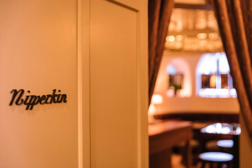 Stylish entrance of Nipperkin in NIJŪ, ideal for intimate private events and gatherings.