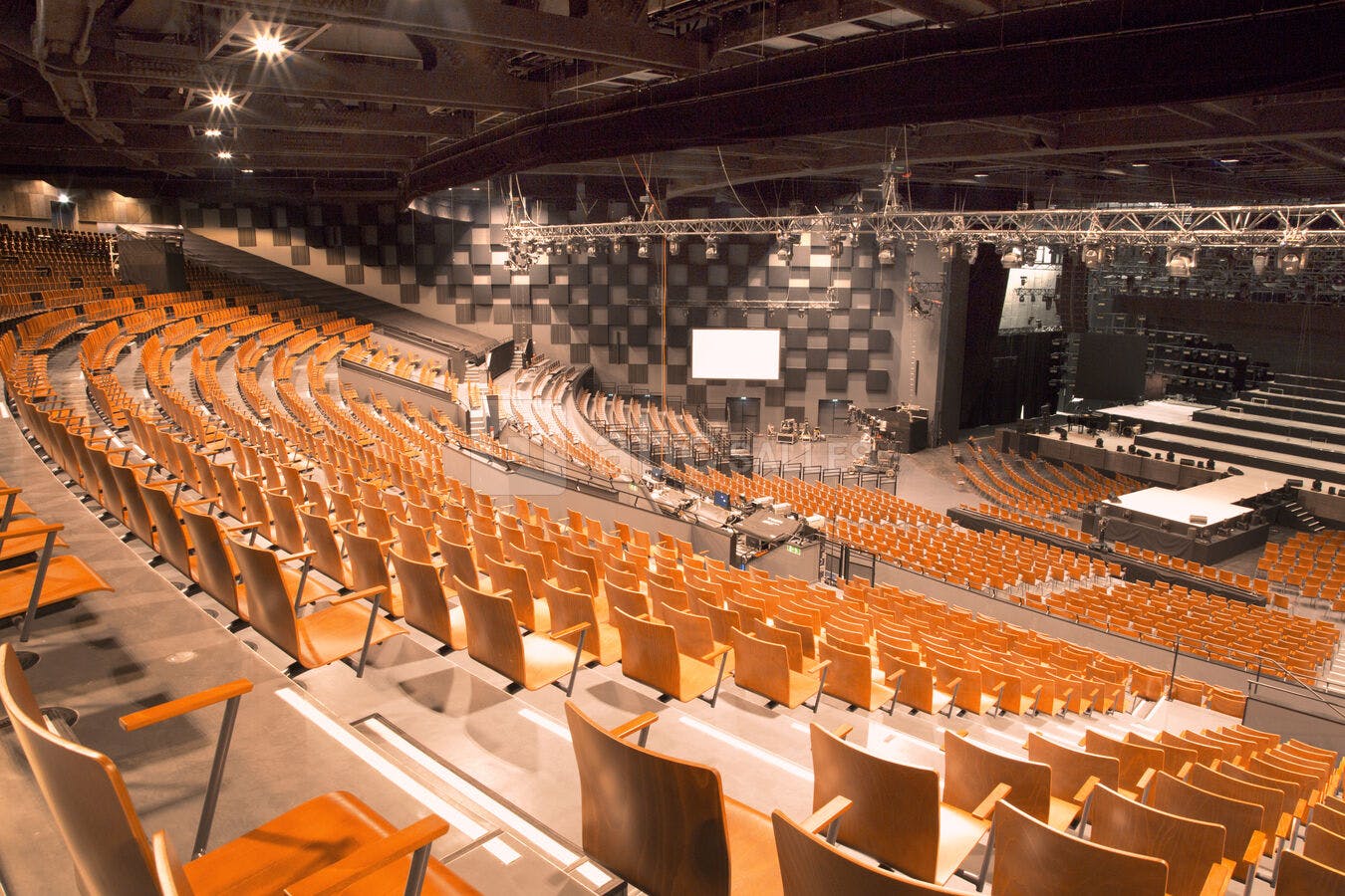 Spacious auditorium with tiered seating for concerts and conferences at La Seine Musicale.