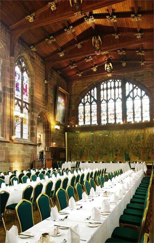 Elegant banquet room with stained glass, ideal for formal events in St. Mary's Coventry.