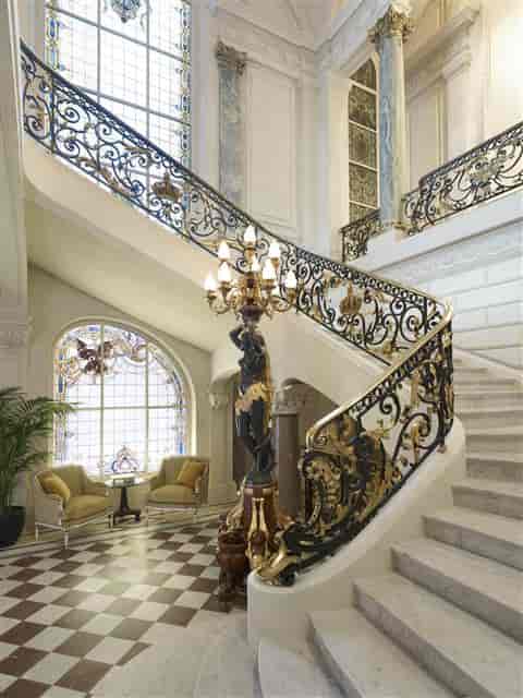 Elegant staircase and chandelier in Le Grand Salon, Shangri-La Paris for upscale events.