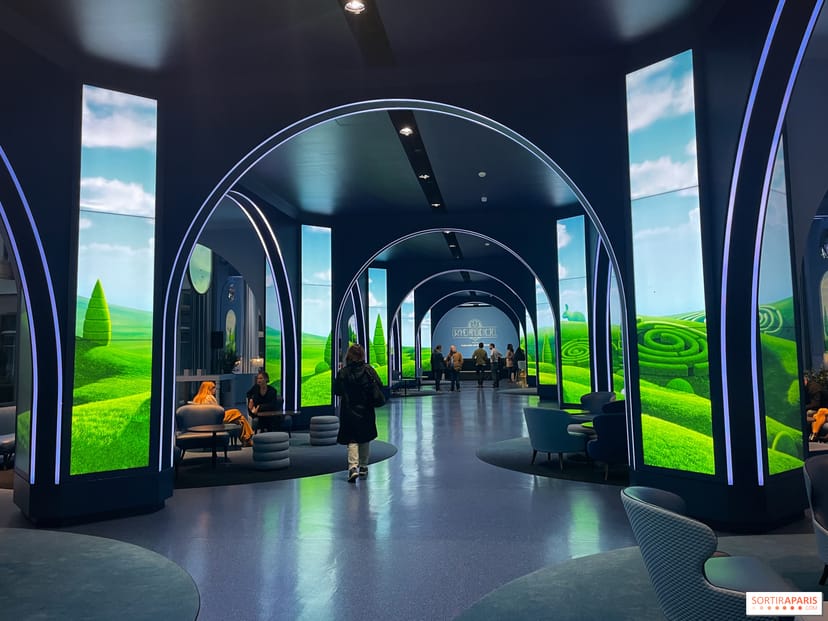 French Garden at Grand Magic Hotel: modern event space with vibrant digital displays.