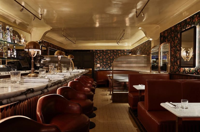 Stylish vintage restaurant with plush seating, ideal for intimate gatherings and events.