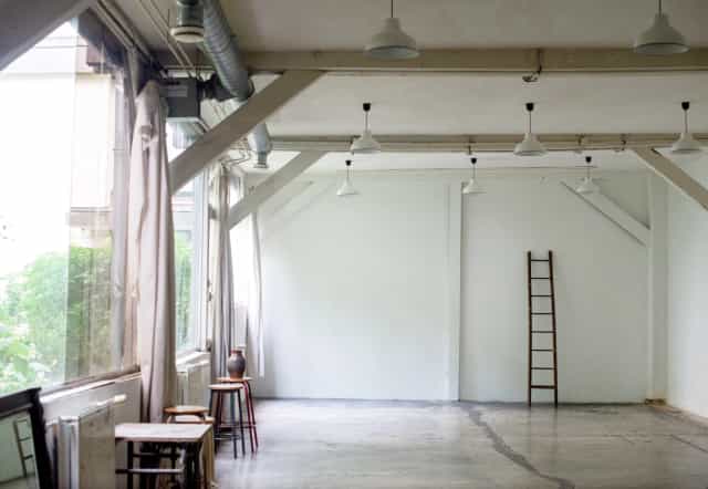 Minimalist event space in Artefact Paris, perfect for workshops and art exhibits.