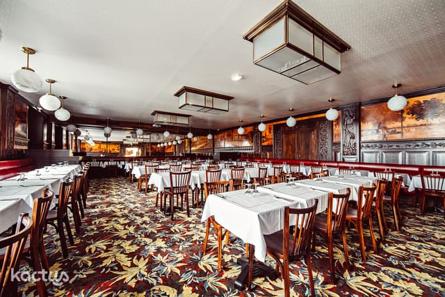 Spacious dining area in COLMAR, Bouillon for elegant events with vintage decor.