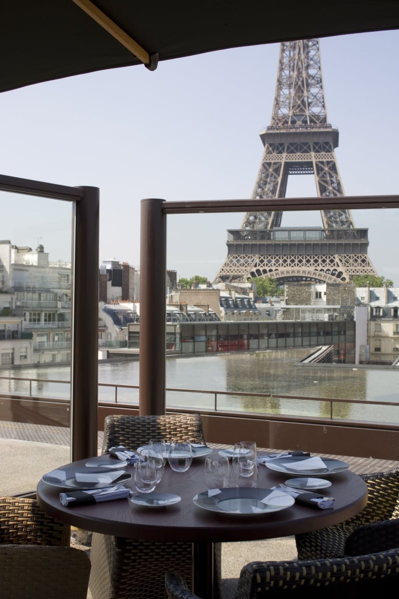 Eiffel Tower view from Le Café Jacques, a modern venue for elegant events and meetings.