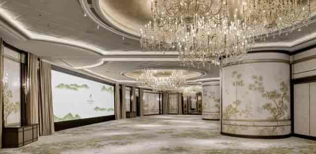 Luxurious Island Ballroom with elegant chandeliers for gala events and meetings.