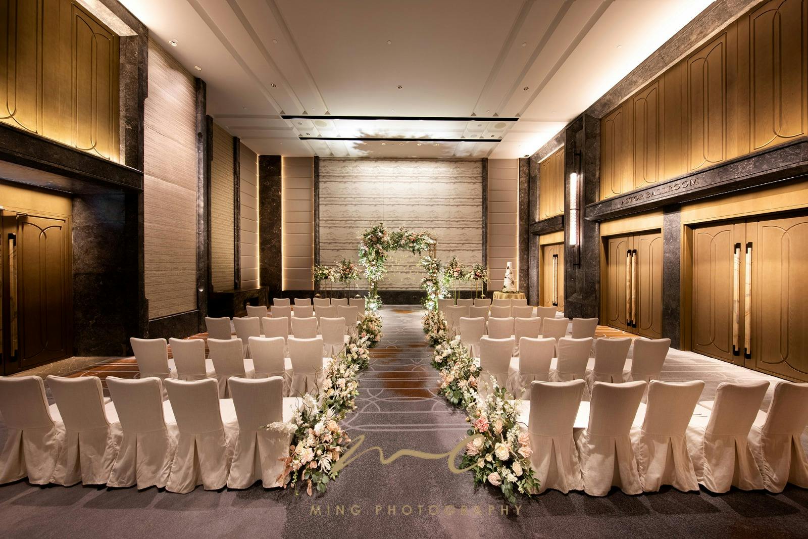 Elegant wedding venue with floral decor at Vincent Astor Pre-Function, St. Regis Hong Kong.