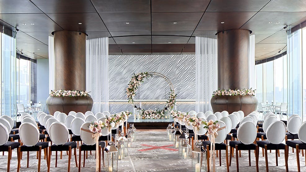 Elegant wedding ceremony setup at Hankow II, featuring a circular floral arrangement.
