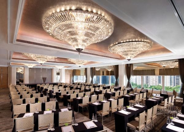 Sophisticated event space in The Mira Hong Kong with elegant chandeliers for corporate meetings.