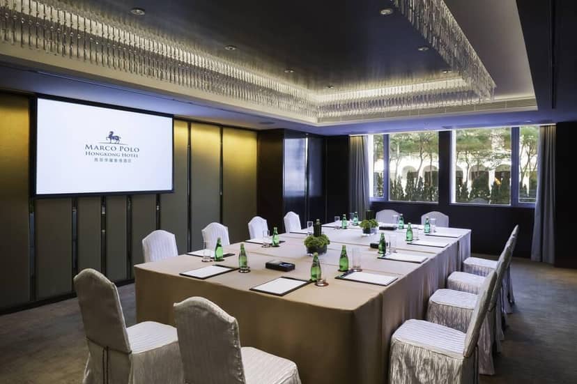 Meeting room at Marco Polo HongKong Hotel with elegant decor for professional events.