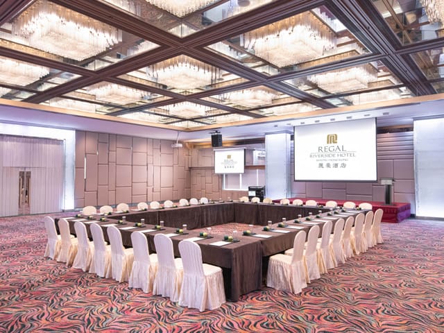 Grand Ballroom at Regal Airport Hotel, U-shaped table setup for corporate events.