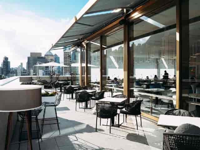 Stylish rooftop venue Popinjays in The Murray, Hong Kong, ideal for events and gatherings.