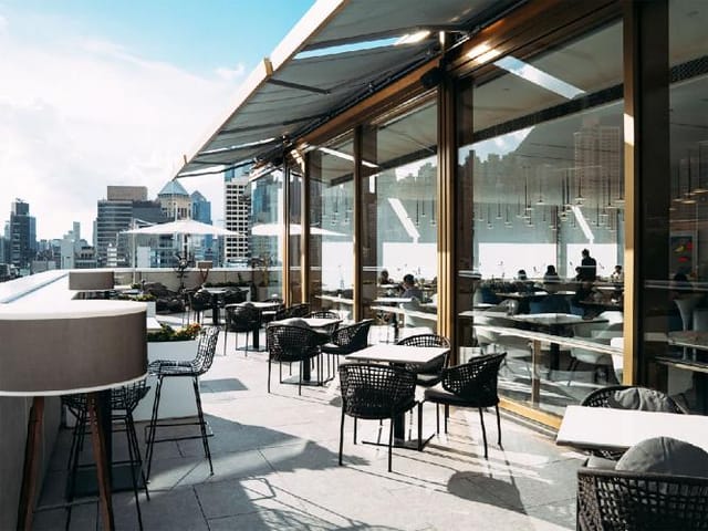 Stylish rooftop venue Popinjays in The Murray, Hong Kong, ideal for events and gatherings.