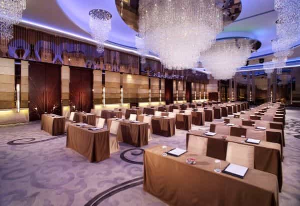 Harbour Grand Hong Kong lobby, elegant chandeliers, corporate event space for meetings.