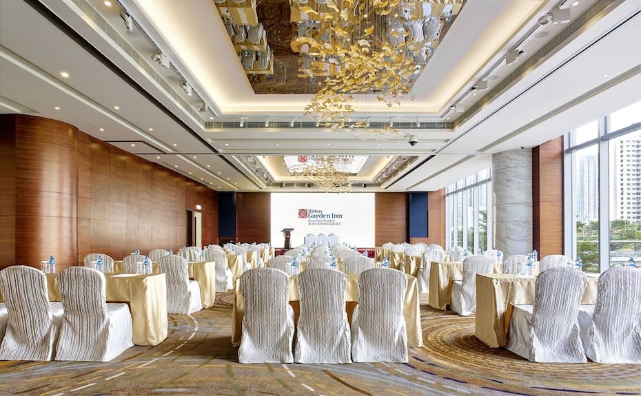 Meeting room at Hilton Garden Inn Hong Kong, ideal for corporate events with elegant decor.