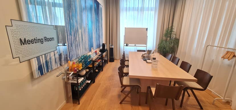 Meeting Room 2 at Waterfront by Habyt, featuring a spacious wooden table for workshops.