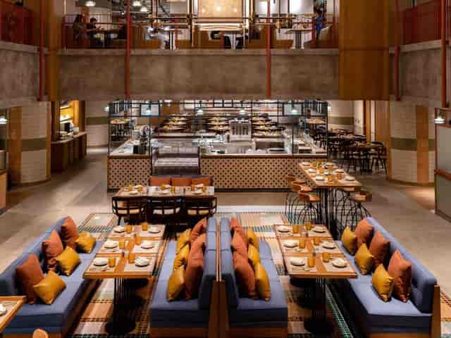 Modern restaurant in Eaton Hong Kong, ideal for events with spacious seating and open kitchen.