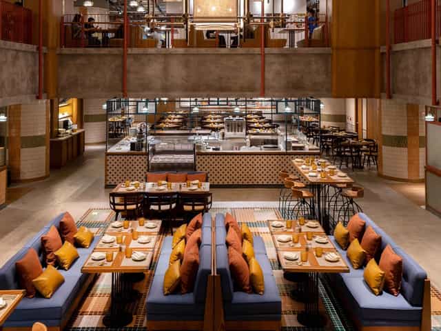 Modern restaurant in Eaton Hong Kong, ideal for events with spacious seating and open kitchen.