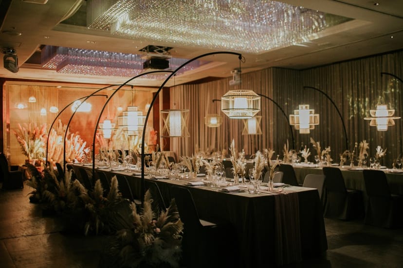 Elegant event space with long tables, ideal for corporate dinners in Eaton Hong Kong.