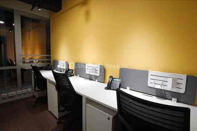 Modern workspace in WorkCave Hong Kong with ergonomic chairs for meetings and events.