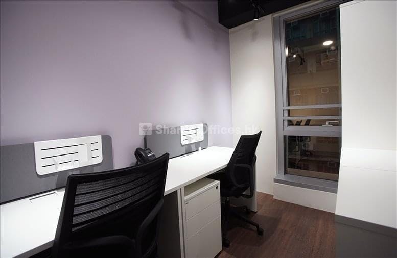 Modern multi-purpose workspace in WorkCave Hong Kong, ideal for meetings and collaboration.