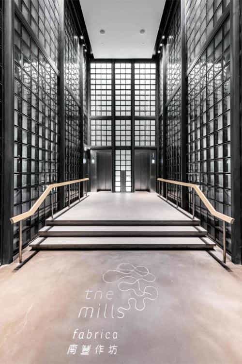 Sleek Fabrica Atrium entrance with glass panels, ideal for corporate events and meetings.