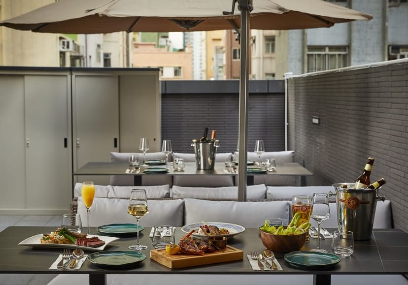 Stylish outdoor dining terrace in Arcane, ideal for corporate events and gatherings.