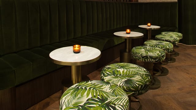 Stylish lounge bar with lush seating, ideal for networking events and informal meetings.