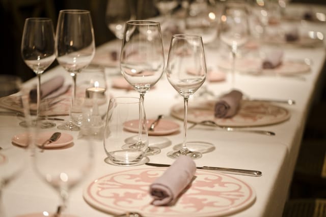 Elegant private dining room with polished glassware for upscale events.