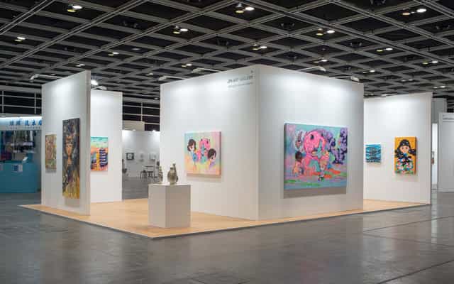 Art exhibition space in Hong Kong Arts Centre with white walls and natural light.