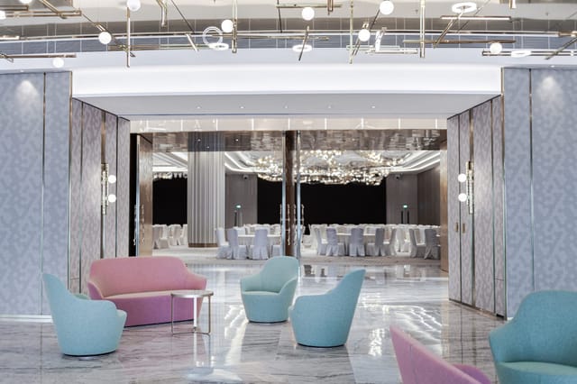 Nina Ballroom at Nina Hotel: elegant event space for corporate meetings and social gatherings.