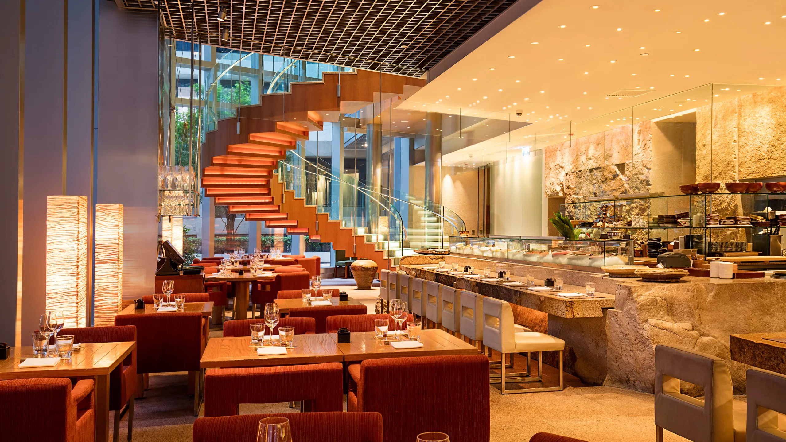 Upscale Zuma restaurant with elegant decor, ideal for events and gatherings.