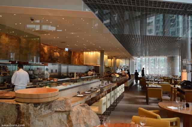 Upscale Zuma bar with sleek design, perfect for intimate events and meetings.