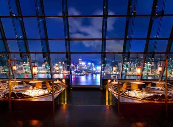 Rooftop bar in Aqua Hong Kong with city skyline views, perfect for upscale events.
