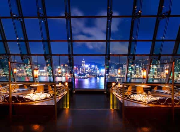 Rooftop bar in Aqua Hong Kong with city skyline views, perfect for upscale events.