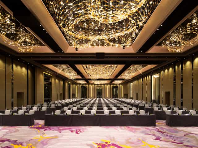 Sophisticated conference center with elegant chandeliers in Crowne Plaza Hong Kong.