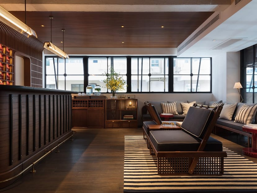 Stylish event space lobby with comfortable seating for networking and meetings.