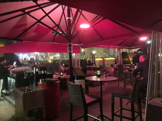 Stylish outdoor venue at The Garage Bar, Cordis Hong Kong for networking events.